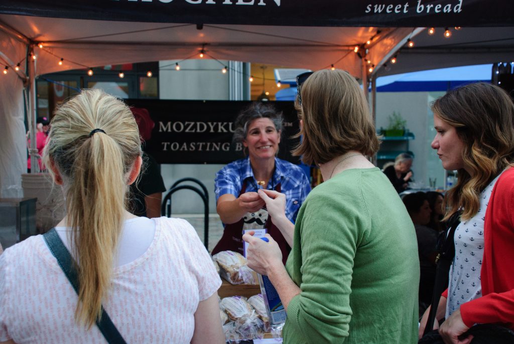 Mozdykuchen hands out samples of sweet bread at Friday's Craft Lake City.