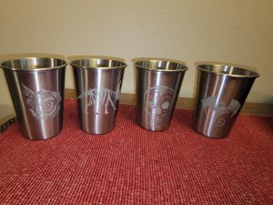 etched metal cups with different patterns